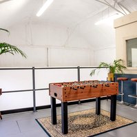 Ultra Sharp Films breakout area with table football.