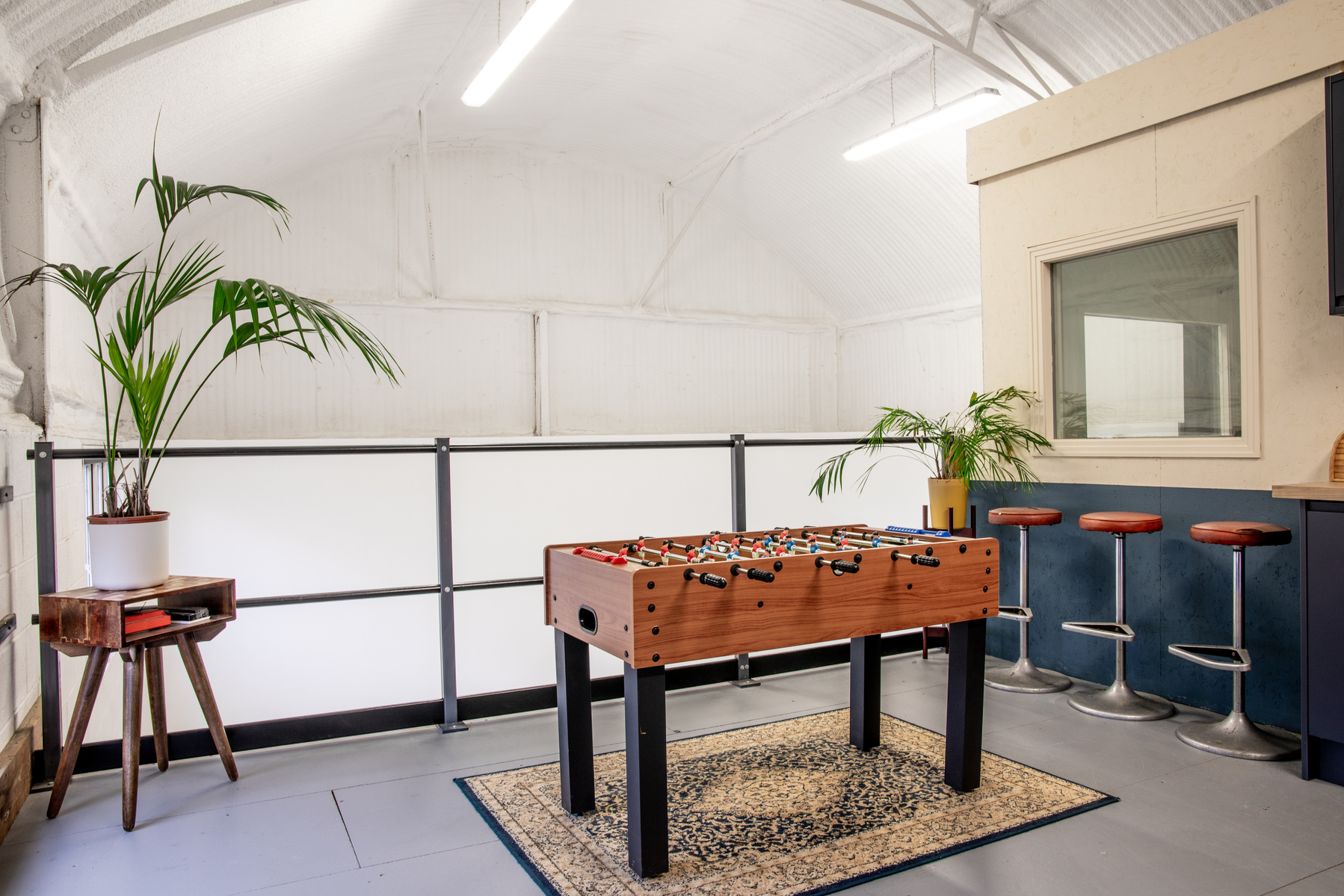 Ultra Sharp Films breakout area with table football.