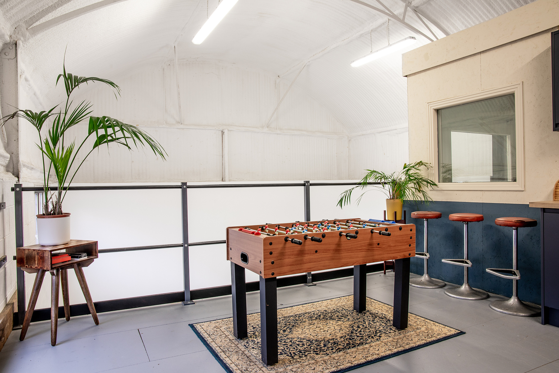 Ultra Sharp Films breakout area with table football.