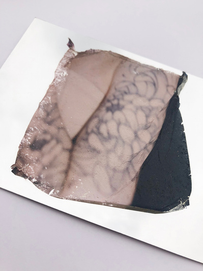 ‘Distorted Bodies’ explores our distorted versions of Beauty and the impact this has on us. Polaroid emulsion lift on mirrored surface.