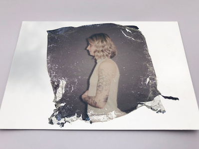 ‘Distorted Bodies’ explores our distorted versions of Beauty and the impact this has on us. Polaroid emulsion lift on mirrored surface.