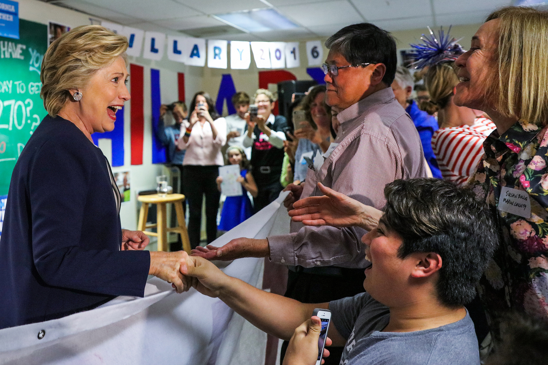 U.S. Democratic Presidential nominee Hillary Clinton greets supporters at an event at the DNC headquarters on Van Ness Avenue in San Francisco, California, on Thursday, Oct. 13, 2016.