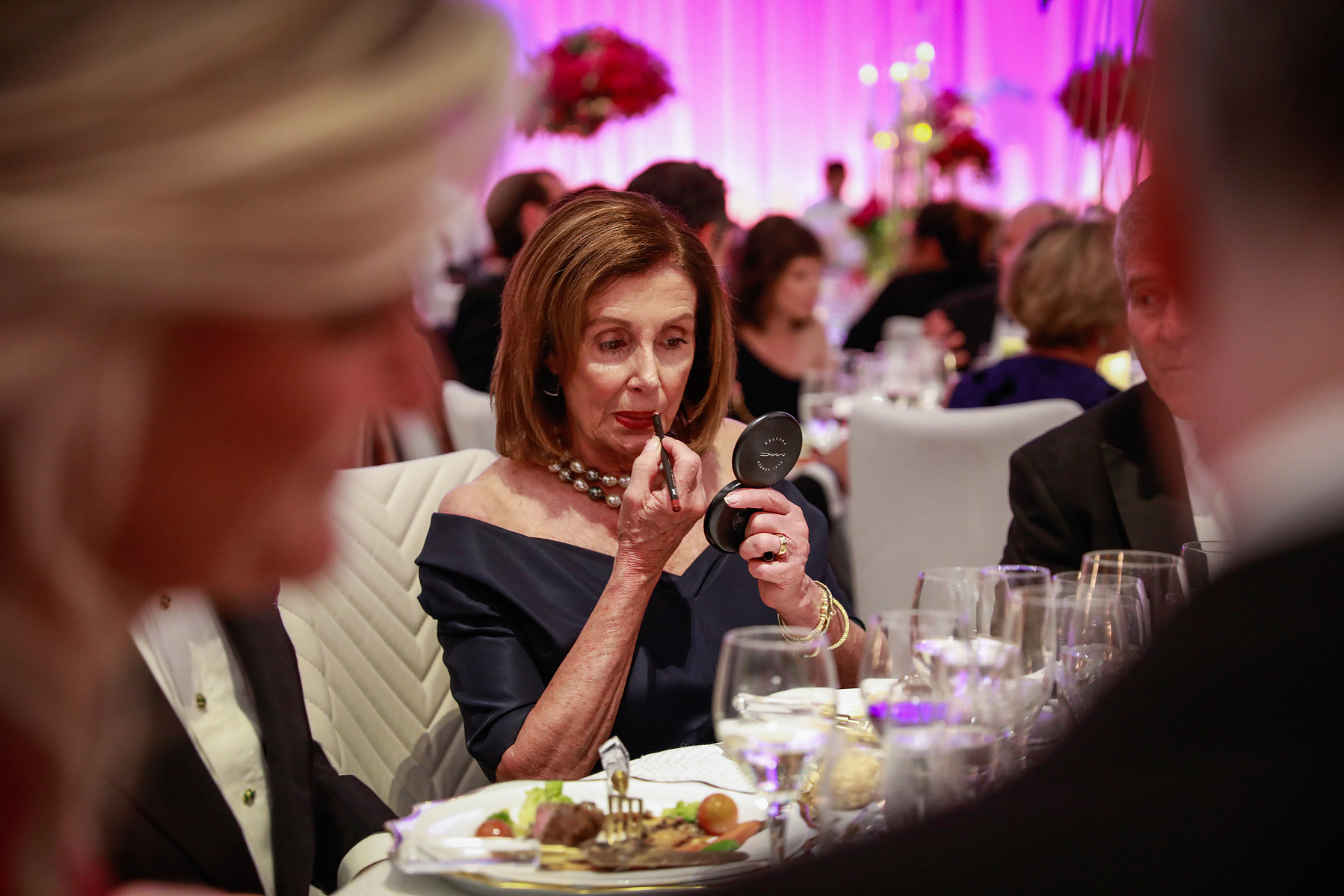 Speaker of the House, Nancy Pelosi reapplies makeup during the 2019 SF Symphony Gala dinner in San Francisco, California, on Wednesday, Sept. 4, 2019.