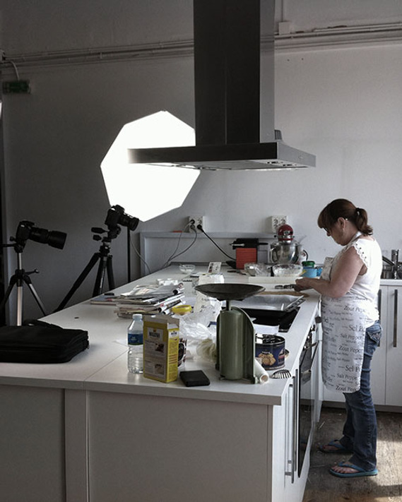 Food stylist Angela Garcia at work in a specialized food photography studio