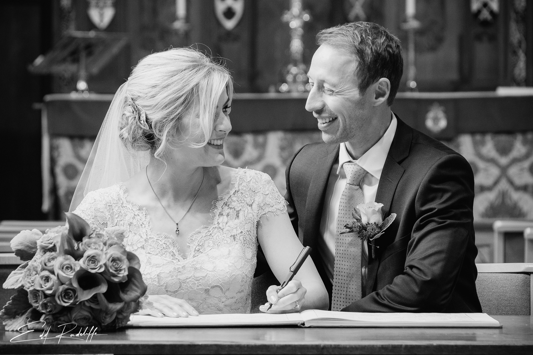 Bride and Groom signing marriage register at Searcy's, 30 St Mary's Axe, London from Edd Radcliffe Photography - documentary style wedding photography