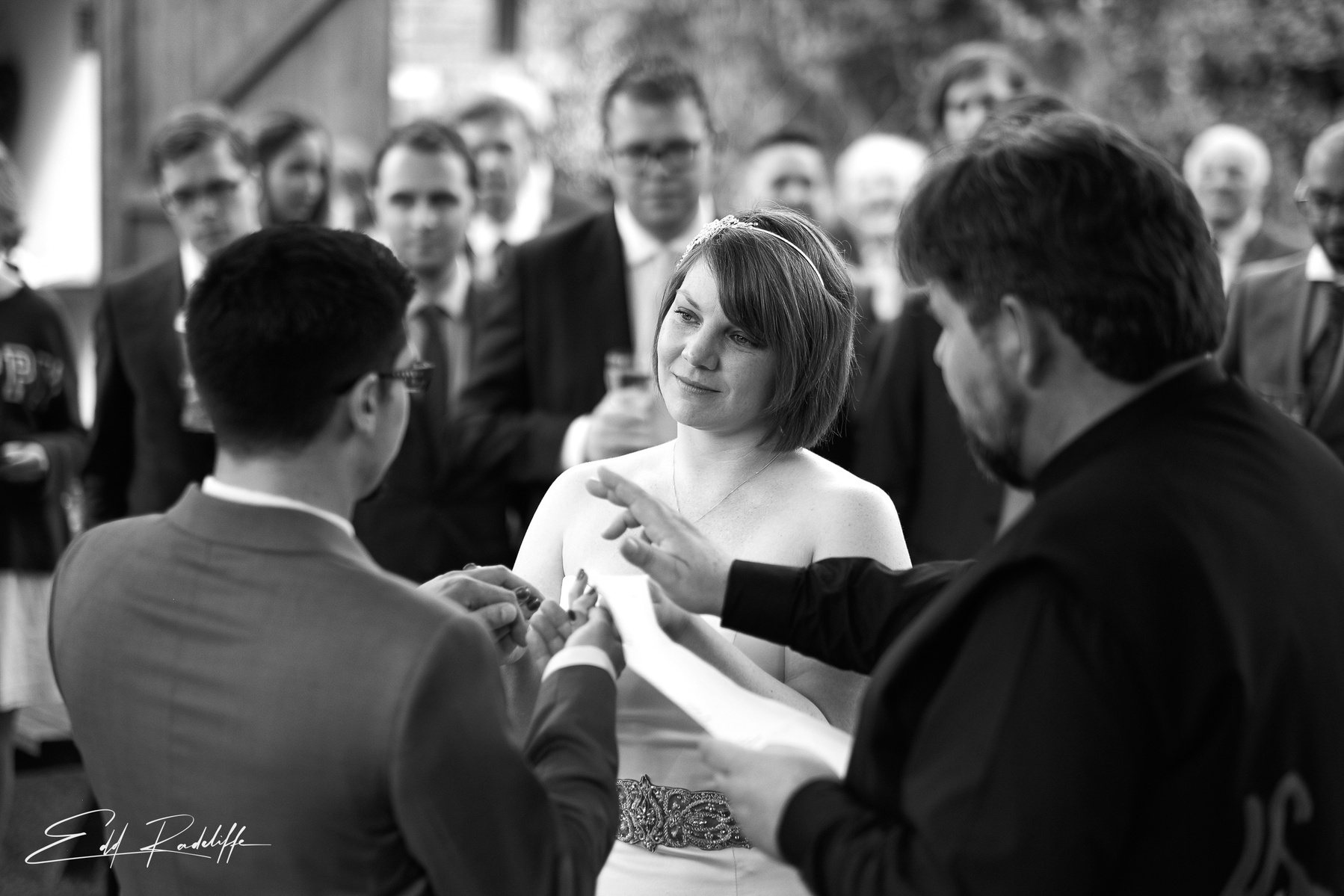 Bride and Groom gaze at each other during wedding ceremony at The Square and Compass for Edd Radcliffe Photography - documentary style wedding photography