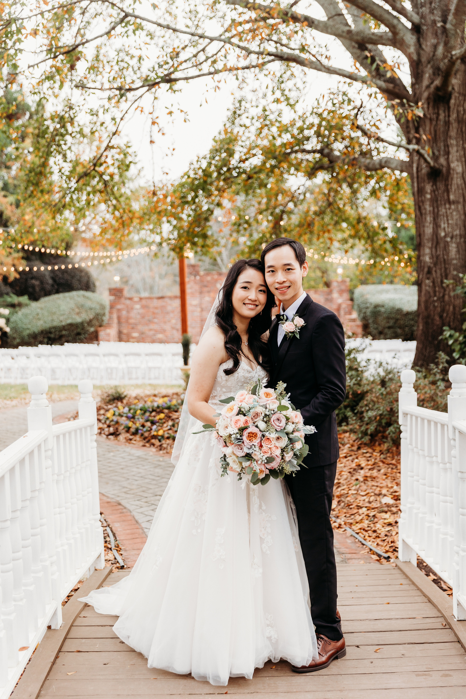 wedding couple on a white bridge