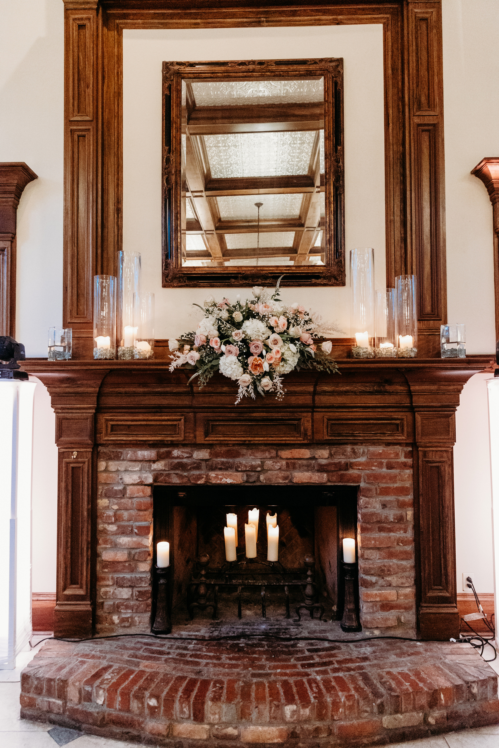 decorated fireplace in wedding reception 