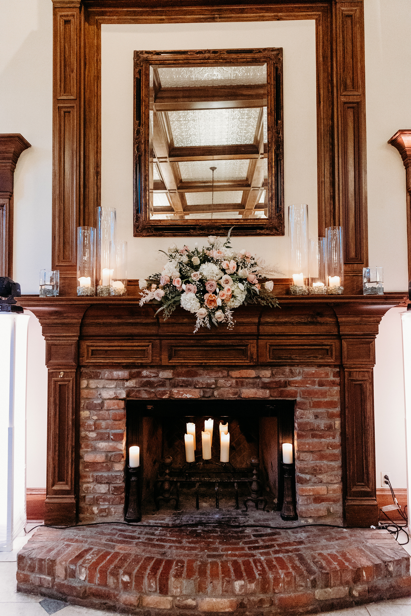 decorated fireplace in wedding reception 
