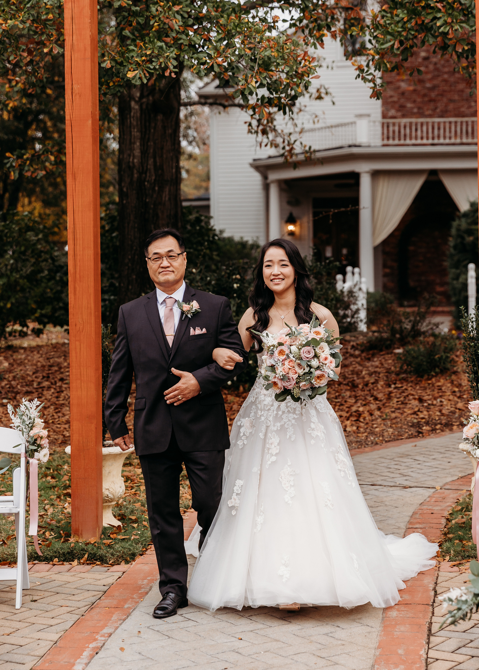 bride and her dad in the aisle