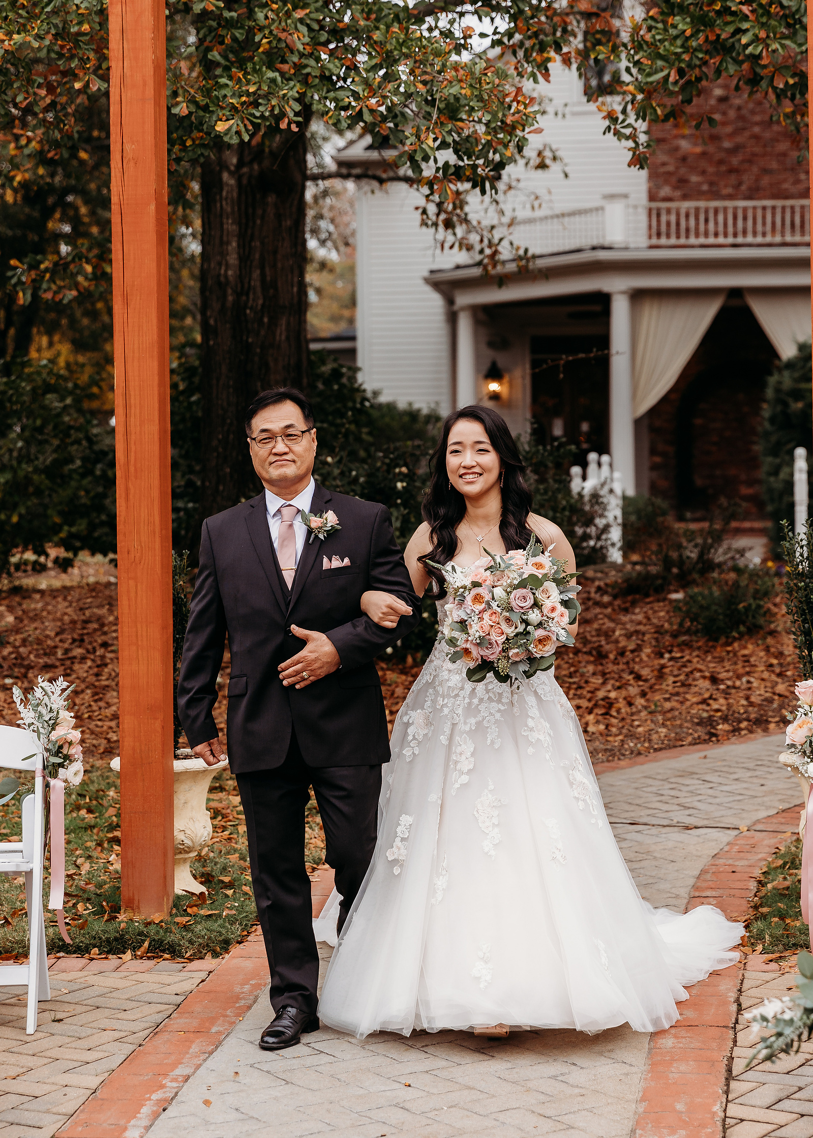 bride and her dad in the aisle