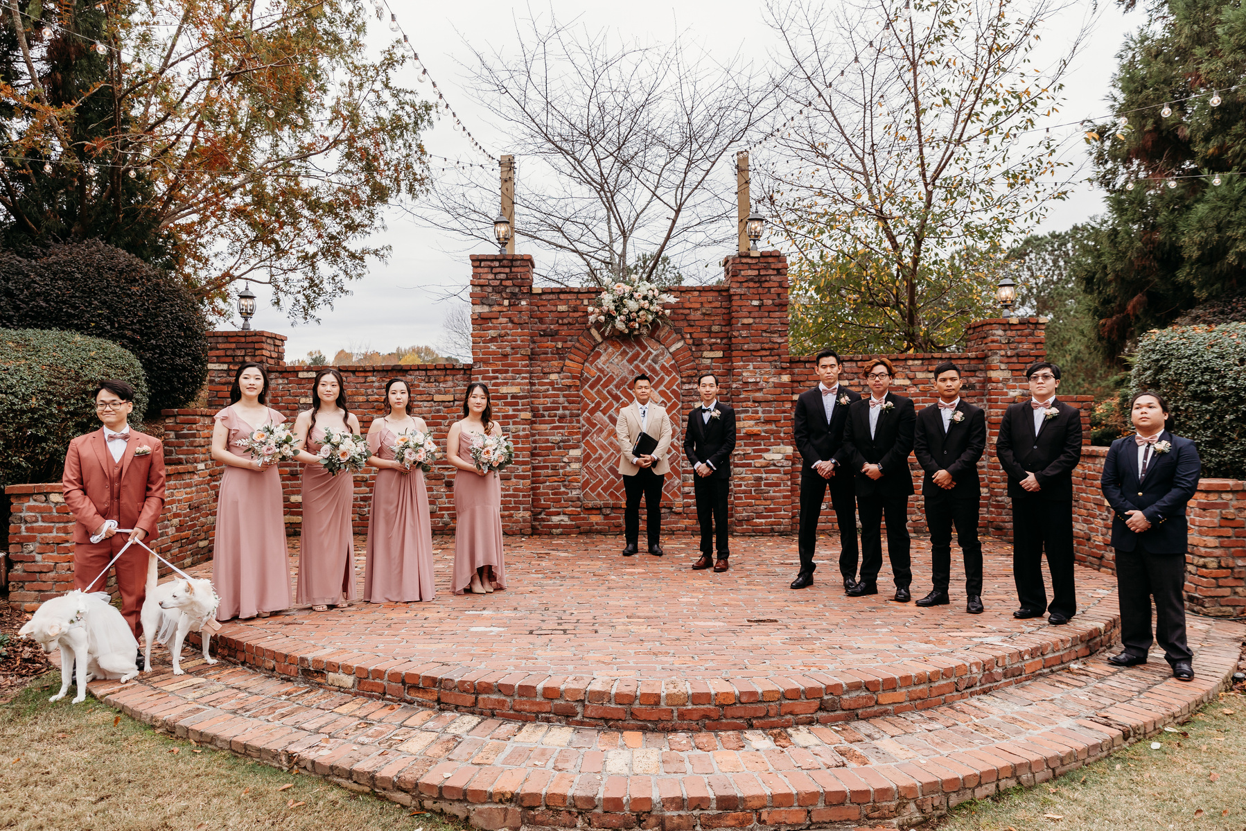 groom and wedding party at altar waiting for bride 