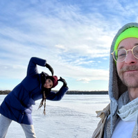 sliding on frozen lake on the mountain