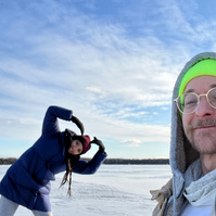 sliding on frozen lake on the mountain