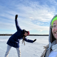 sliding on frozen lake on the mountain