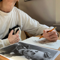 lizzy being a cuddle while francis draws his opa