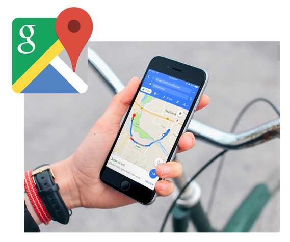 Hand holding phone showing google maps app