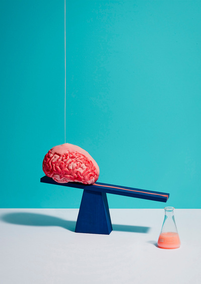 An intriguing and conceptual composition featuring a blue small seesaw. This thought-provoking image is skillfully captured by David Lineton, a modern still life photographer in London