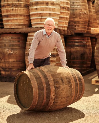 The Balvenie Malt Master David C Stewart Nosing and inspecting a Casked Barral in Speyside Scotland.