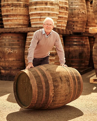 The Balvenie Malt Master David C Stewart Nosing and inspecting a Casked Barral in Speyside Scotland.