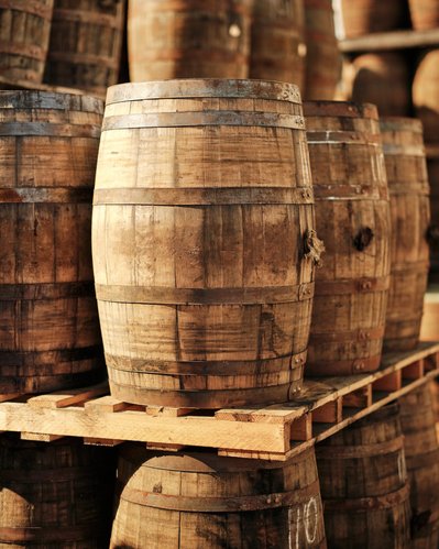 A wooden cask barrel stacked at The Balvenie Distillery tour in Dufftown, Inverness Scotland. 