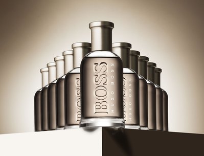 A captivating arrangement of many fragrances, capturing the essence of fragrance photography in London. This visually pleasing composition is skillfully photographed by David Lineton, an expert in fragrance photography