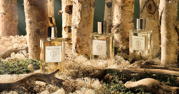 Silver birch woodland mossy and earthy scene of Mizensir Perfumes sitting on the a woodland floor.