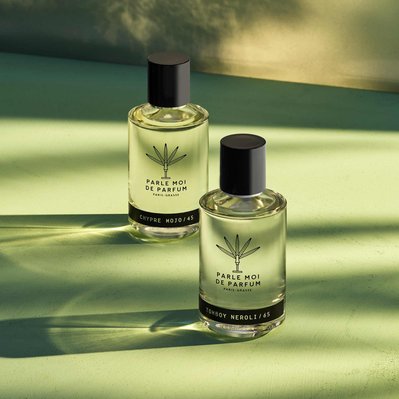 A captivating image featuring two perfume bottles, capturing the essence of fragrance photography in London. This visually appealing composition is skillfully photographed by David Lineton, an expert in fragrance photography