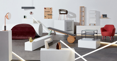 A well-composed interior scene featuring various household items such as sofas, beds, and drawers. captured by David Lineton, a specialist in commercial still life photography in London