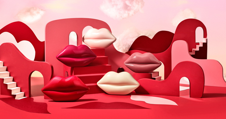 Lulu Guinness Lip clutch bags sit in Cloud 9 for Valentine's Campaign. The glossy lip handbags are framed up with the curved lines of the set. Mirrors and archways reflect a surrealistic world