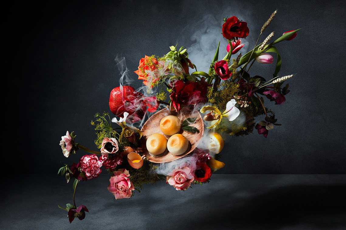 Gaggenau Food Still life. Oriental dishes by Andrew Wong are displayed around a vibrant floral arrangement. smouldering smoke ties in the rich and dark dutch masters series