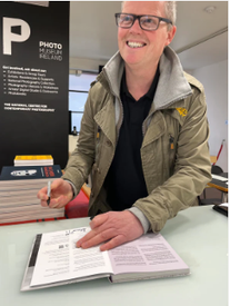 Richard Gosnold, signing photobook 'It Starts With Silence' at Photo Museum Ireland.  