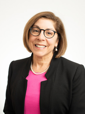 architecht woman in glasses head shot photography white background