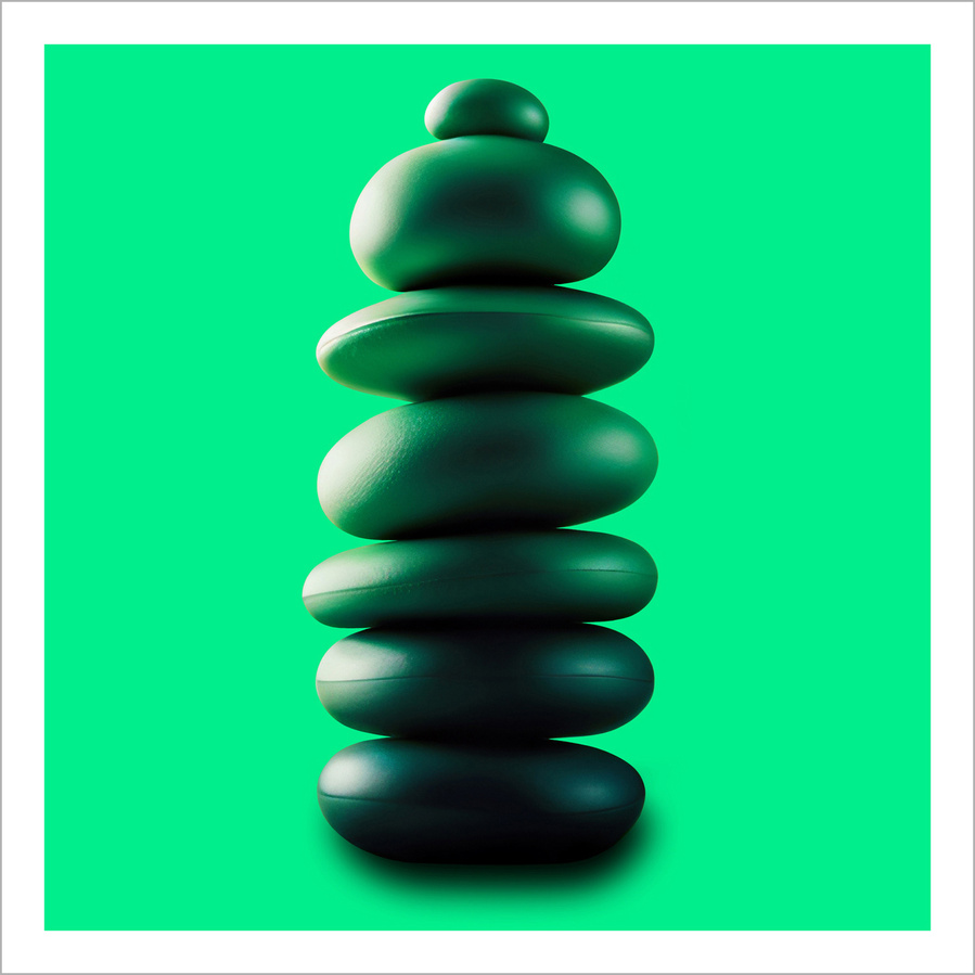 An inefinable green object on a plain vibrant green background