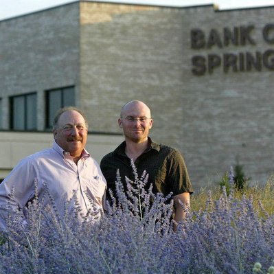 Tom Marantz and Adam Woodruff among Russian sage at the Bank of Springfield gardens, blending visionary design with nature.