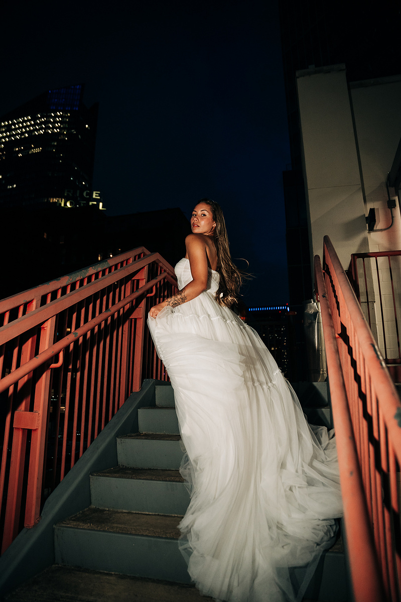 Bride in the rooftop of a parking garage in Houston, TX