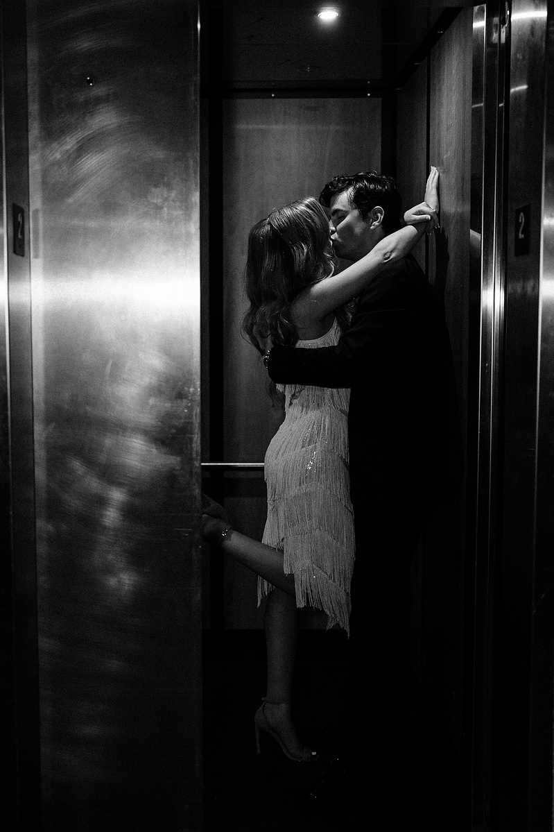 Newly wed couple kissing in an elevator in Houston, TX
