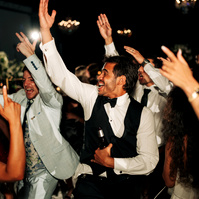 Guests of a wedding having fun at reception.