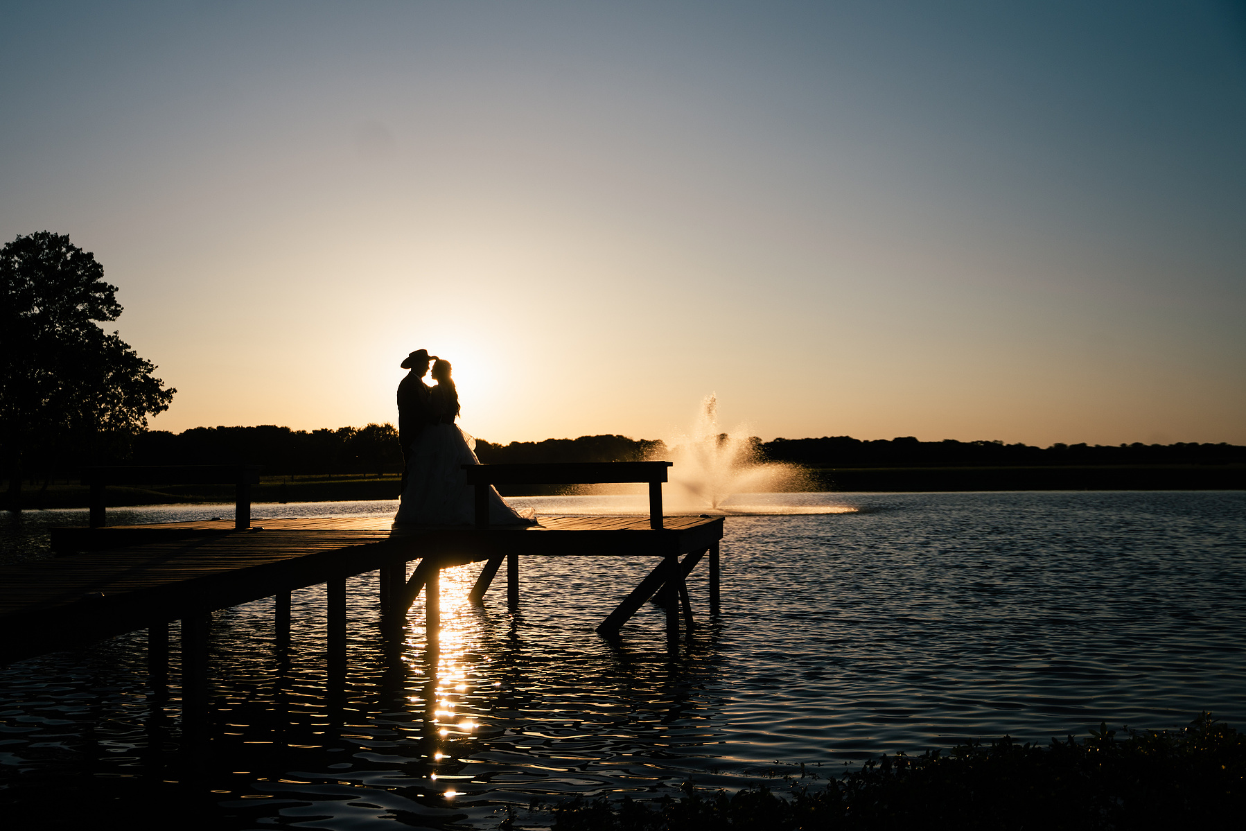 Silhouette of bride and groom eloping in Houston, TX
