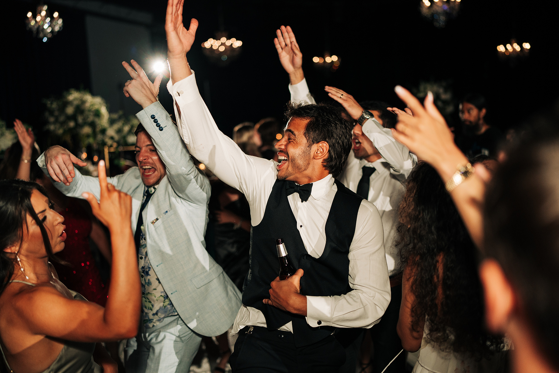 Guests of a wedding having fun at reception.