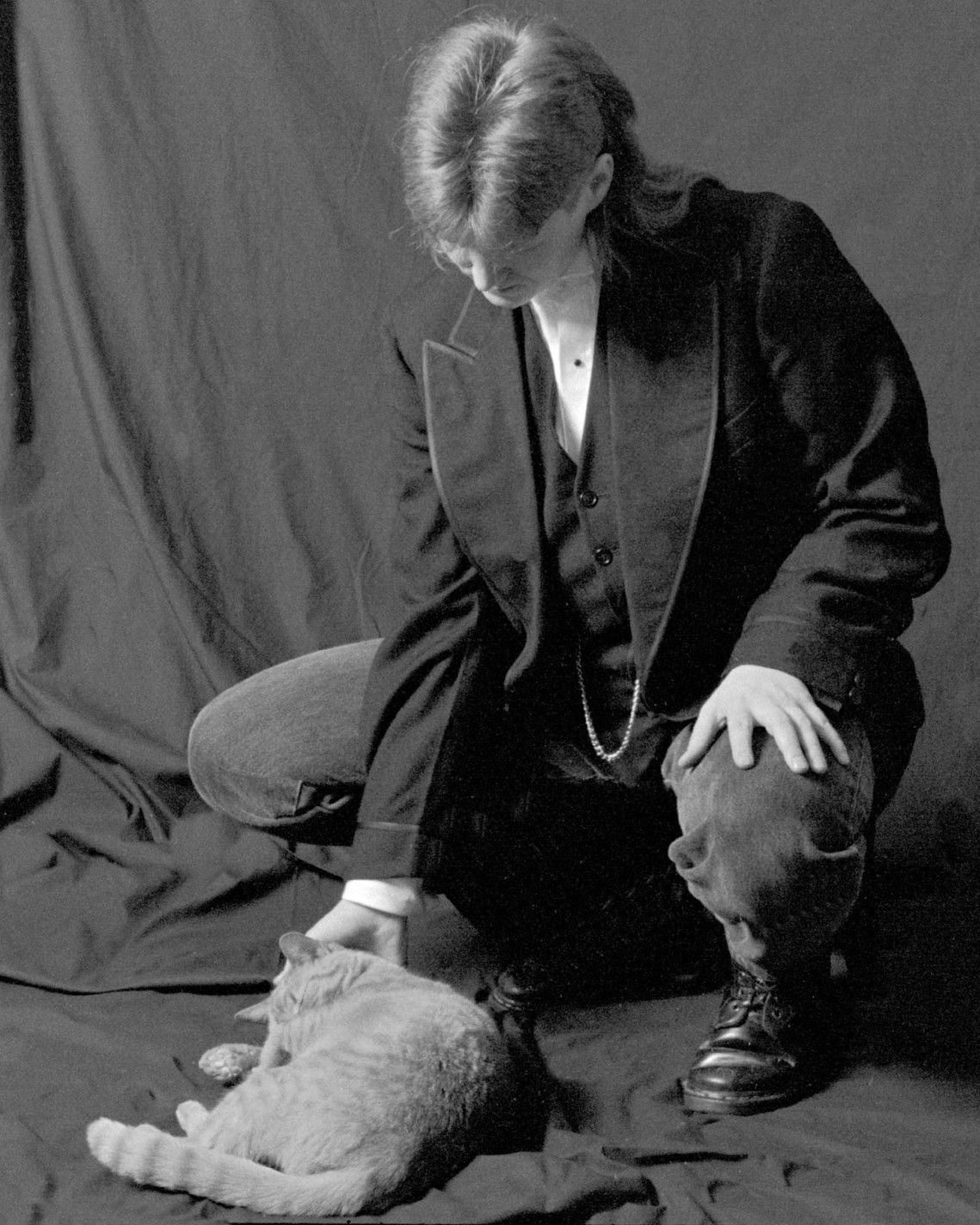 self portrait in tux with Gwen the cat