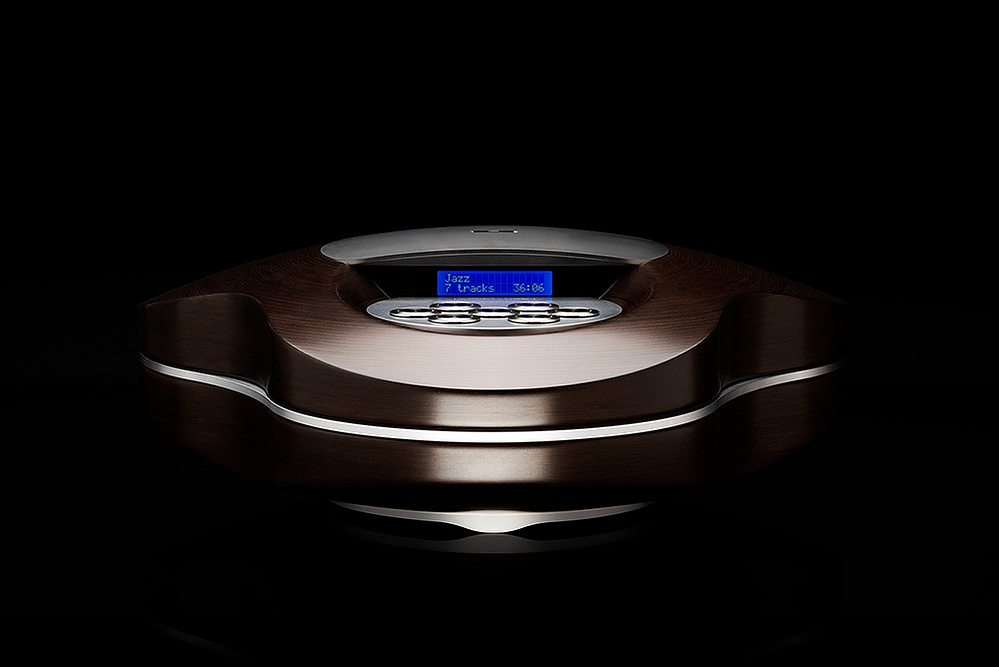 A precission advertising studio product photograph of a High End audiophile SD Card player