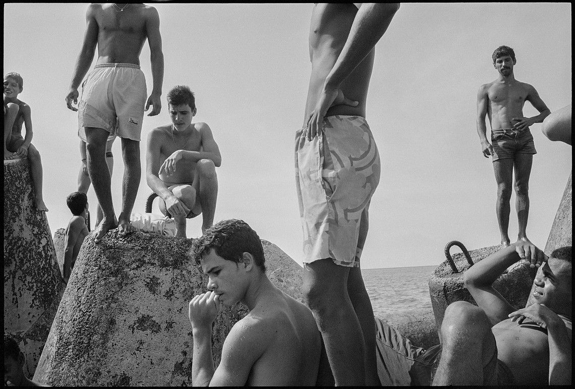 Nicholas Blair Photography copyright 1992, men thinking,  Malecon, black and white