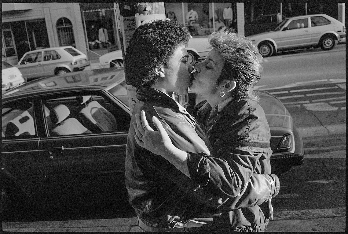 Nicholas Blair photography copyright 1982, black and white, lesbian couple, LGBTQ, kissing