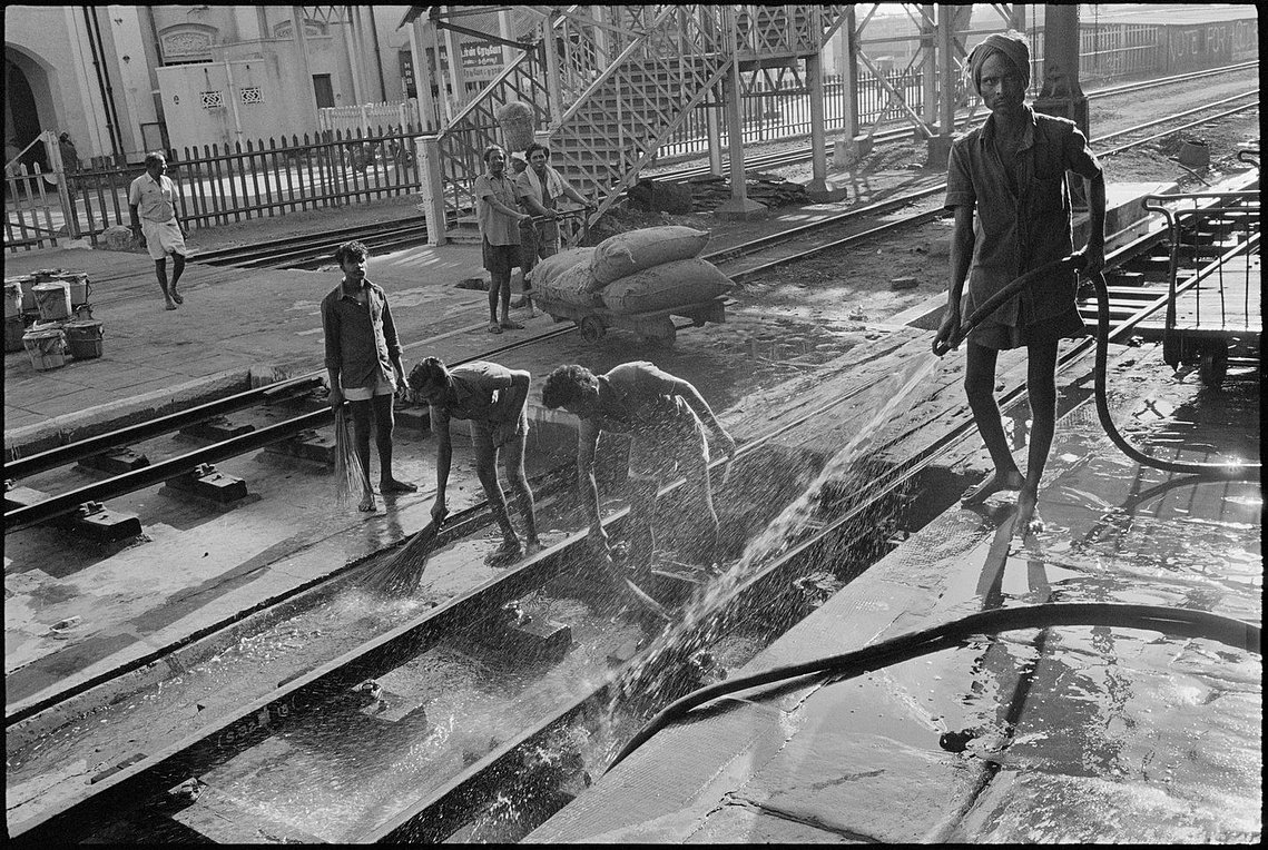 Nicholas Blair photography copyright 1978, black and white, workers, trains, water