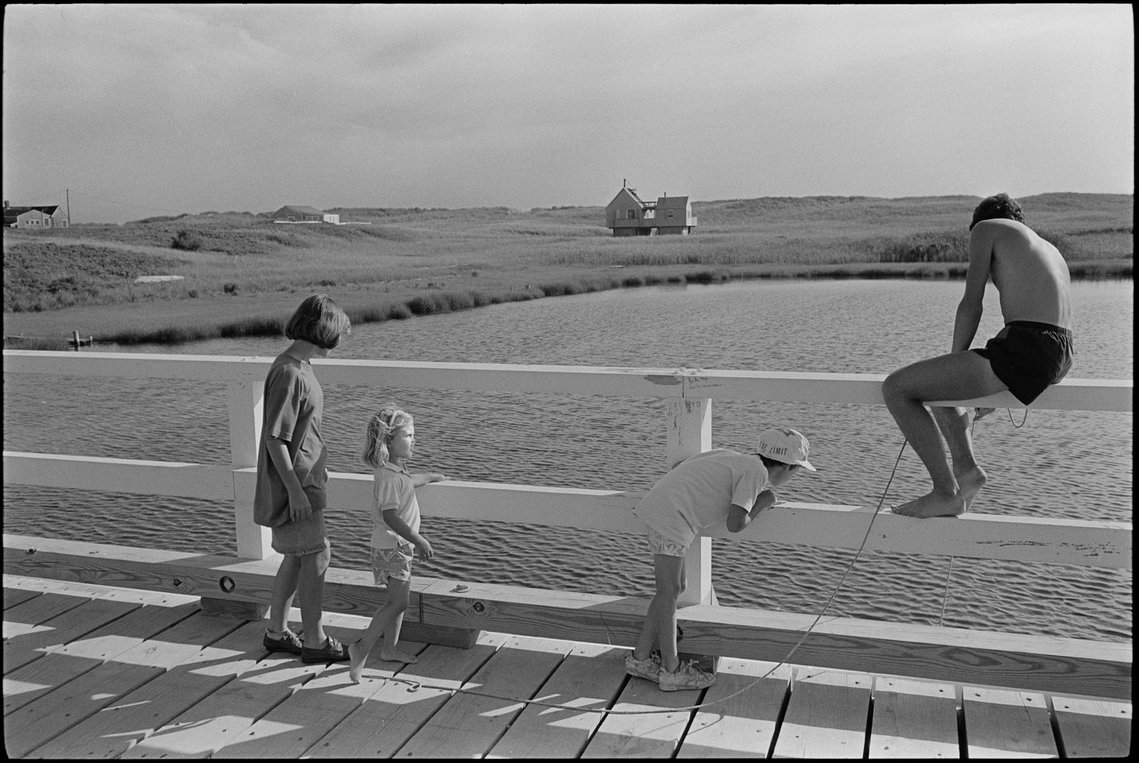 Nicholas Blair photography copyright 1985, black and white, children fishing