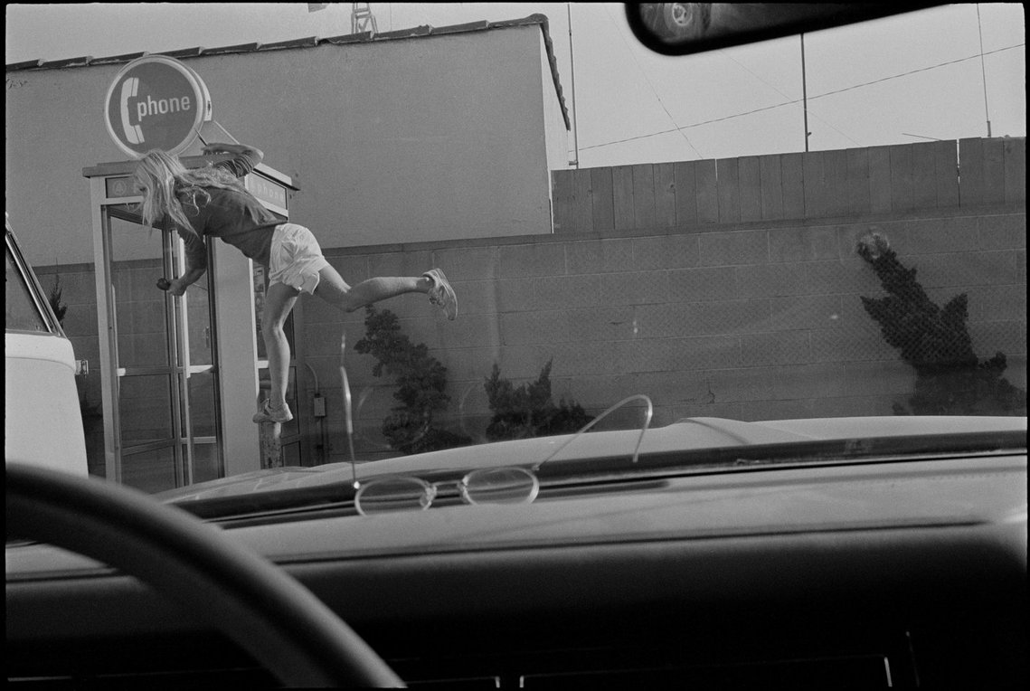 Nicholas Blair photography copyright 1977, black and white, man balancing