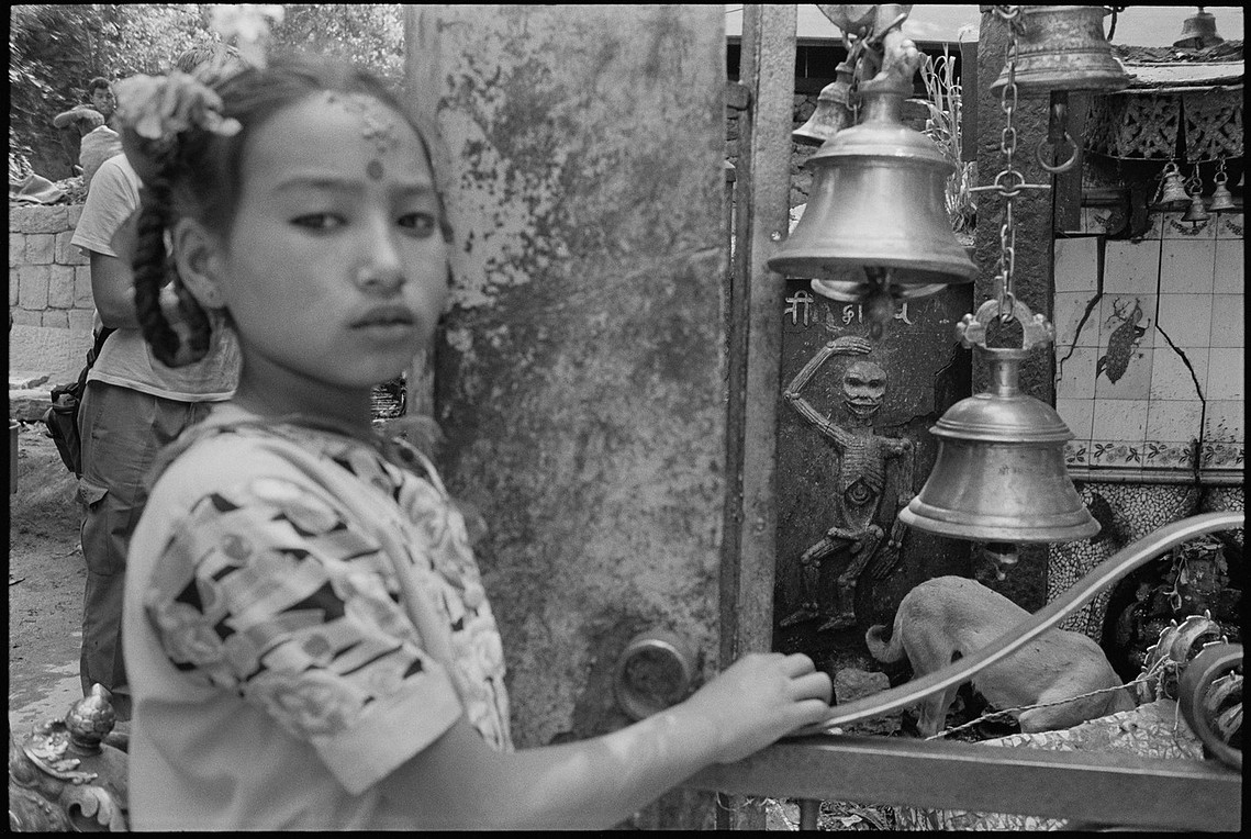 Nicholas Blair Photography copyright 1986, girl, shrine, black and white