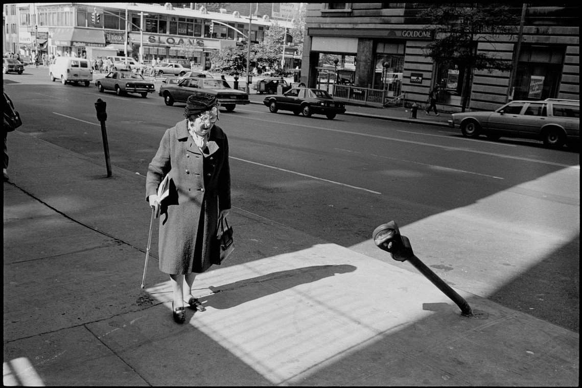 Nicholas Blair Photography copyright 1985, elderly lady, urbane culture, street scene, black and white
