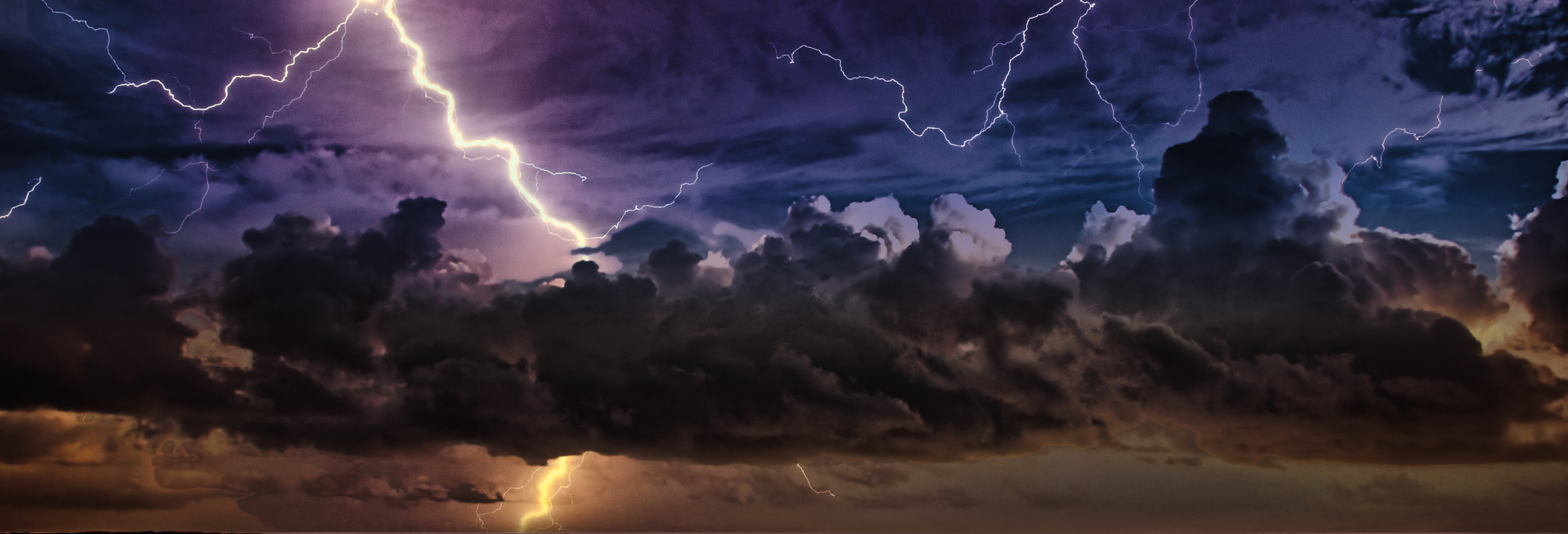 "Thunderborn" captures the fierce and fleeting majesty of nature’s most electrifying force. In a single frame, lightning fractures the night sky, illuminating the churning storm clouds below like fire cracking through stone. The atmosphere roars with moti